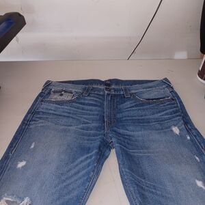 Distressed Blue Jeans